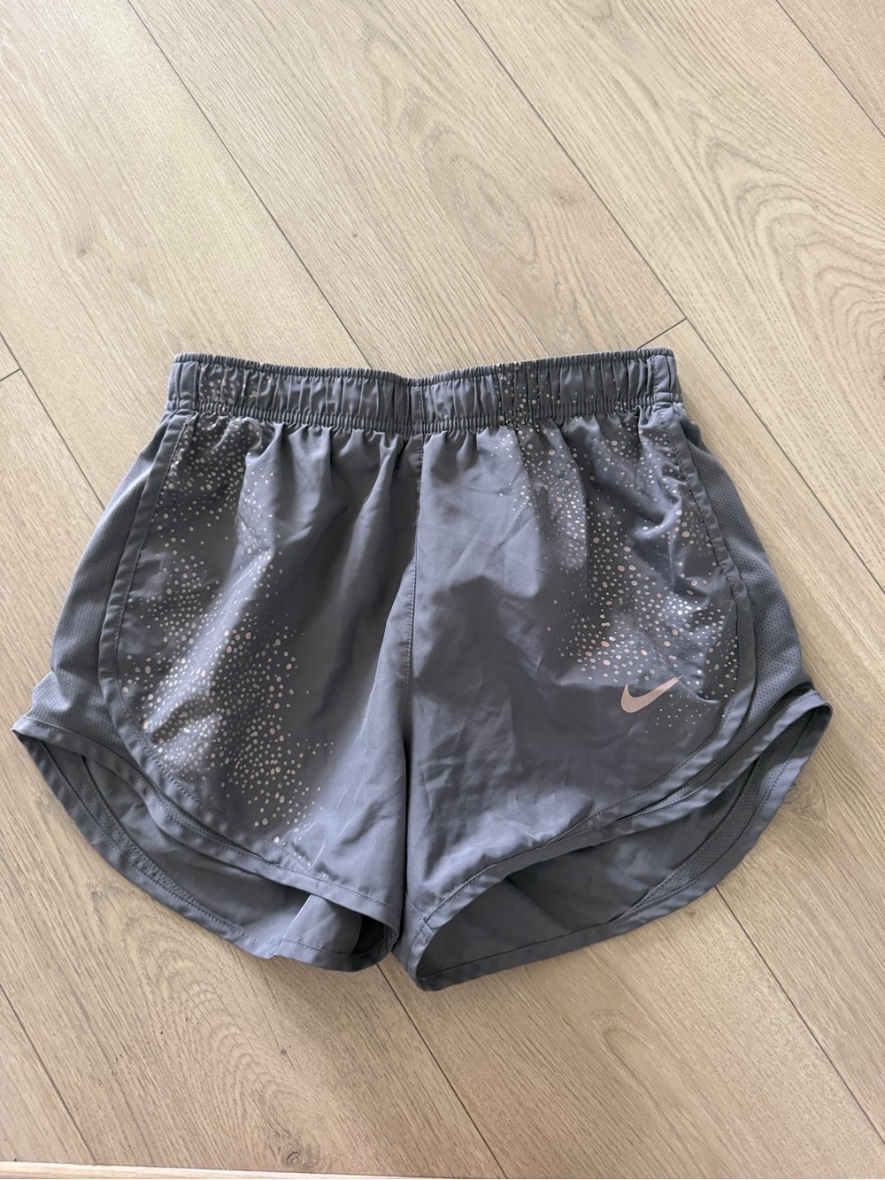 Nike Women's Gray Athletic Shorts with Reflective Dots